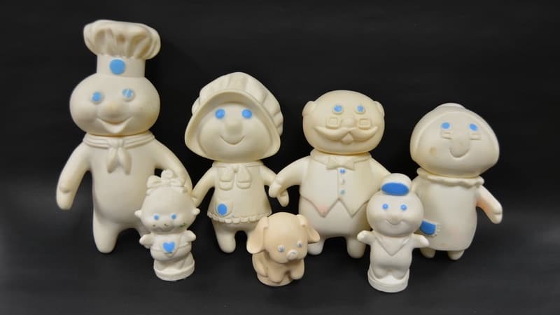 Dolls of the Pillsbury Doughboy and the other members of the Poppin’ Fresh Family, 7 figures total.